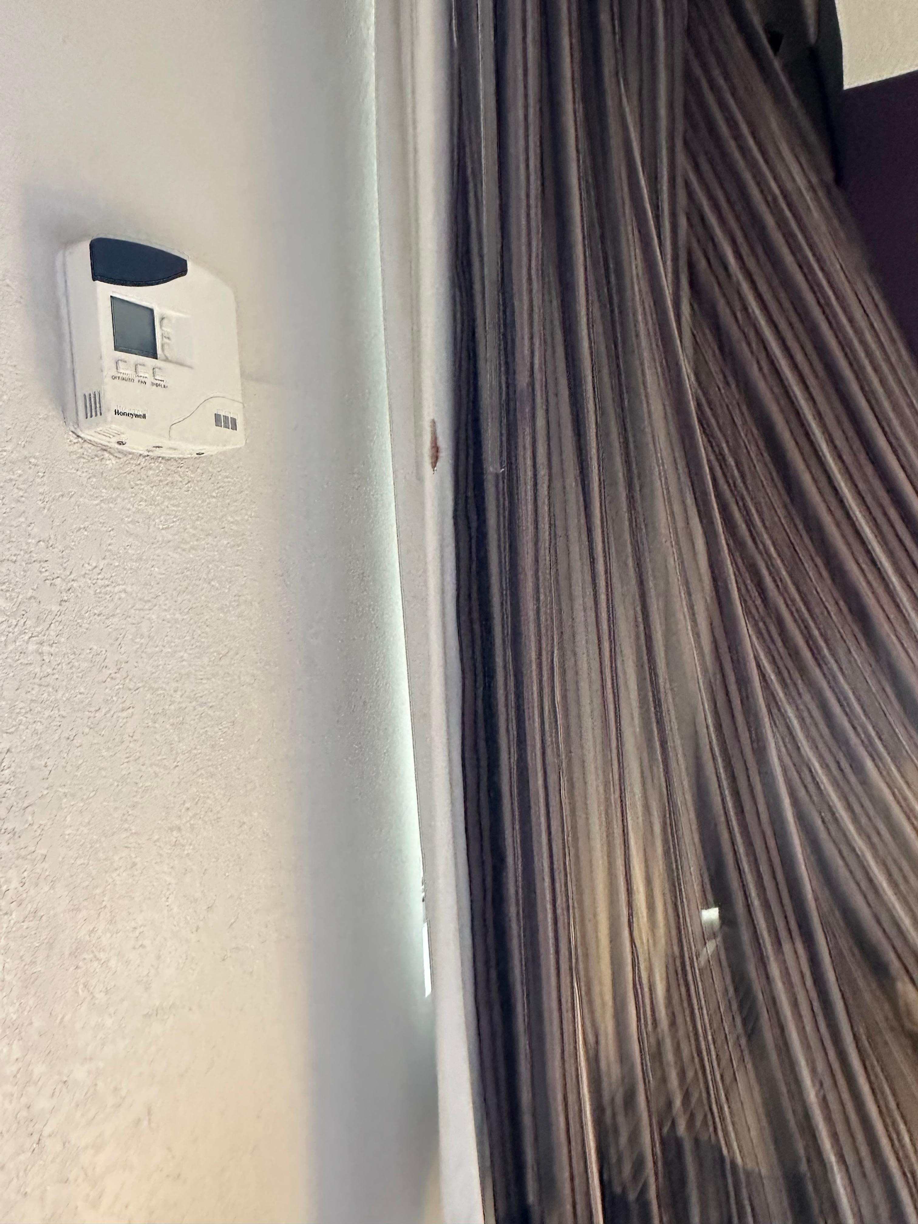 Looks like dried blood on the curtain