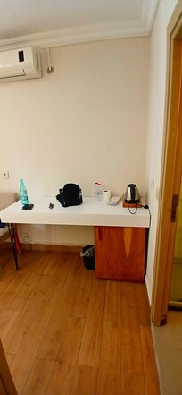 kettle and mini fridge included but only tea, no coffee