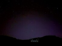 The neighboring cottage w/ a sky full of stars