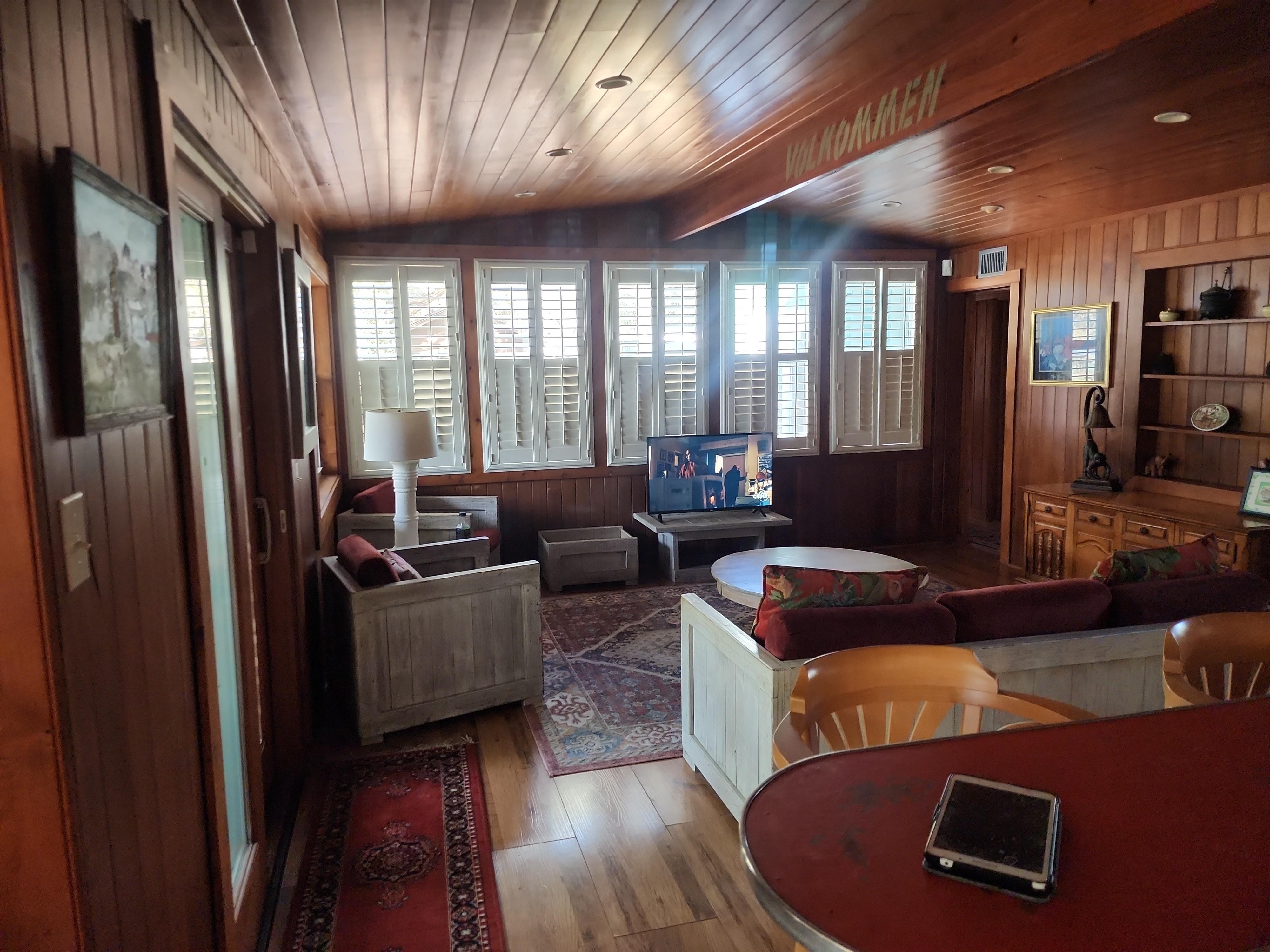 Lots of light during the day with a screened porch