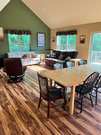 Large kitchen table with two couches