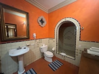 Unique bathroom with walk in shower and upgraded towels.