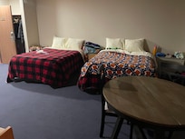 View of main bedroom beds