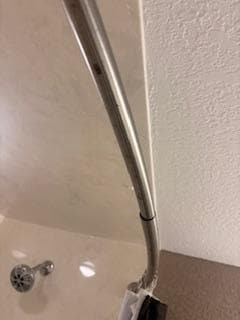rust on the shower bar