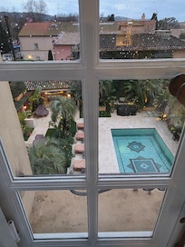 Heated hotel pool from top floor room view