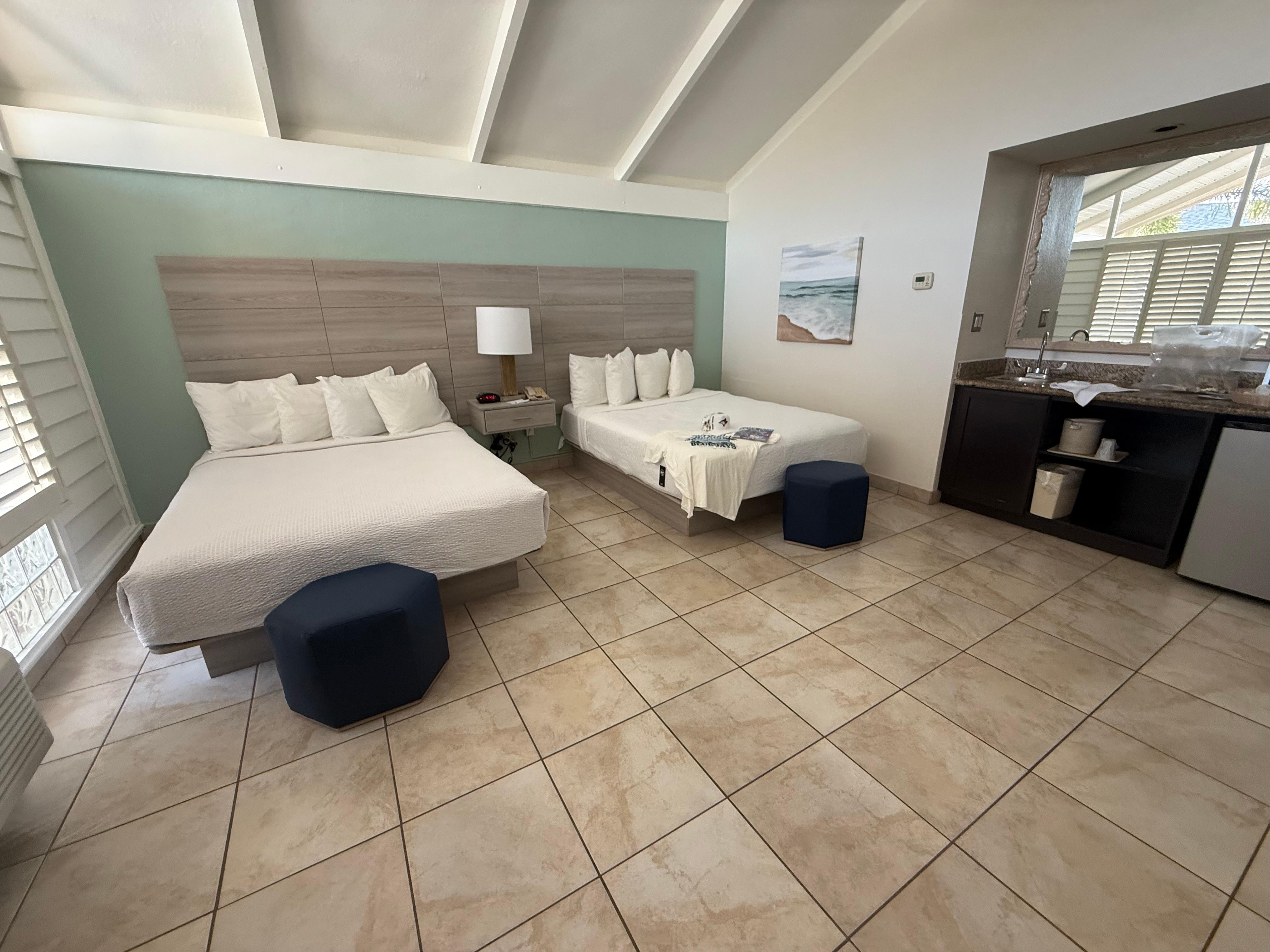 Beds were comfortable and clean. There is a kitchen sink, fridge, microwave and coffee machine 