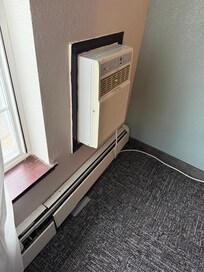 Dilapidated air conditioner.
