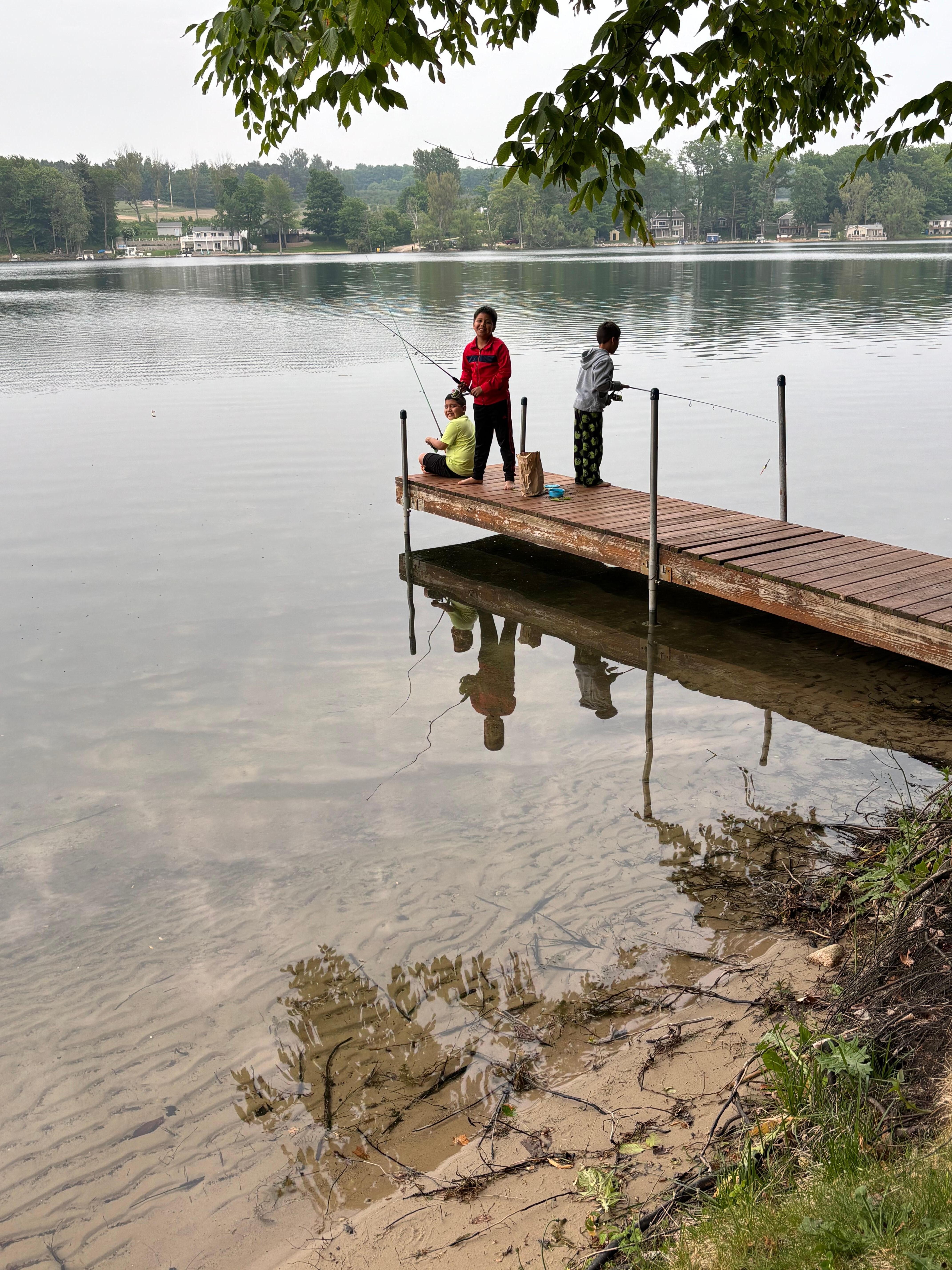 Fishing by the little pier that is part of the cottage 