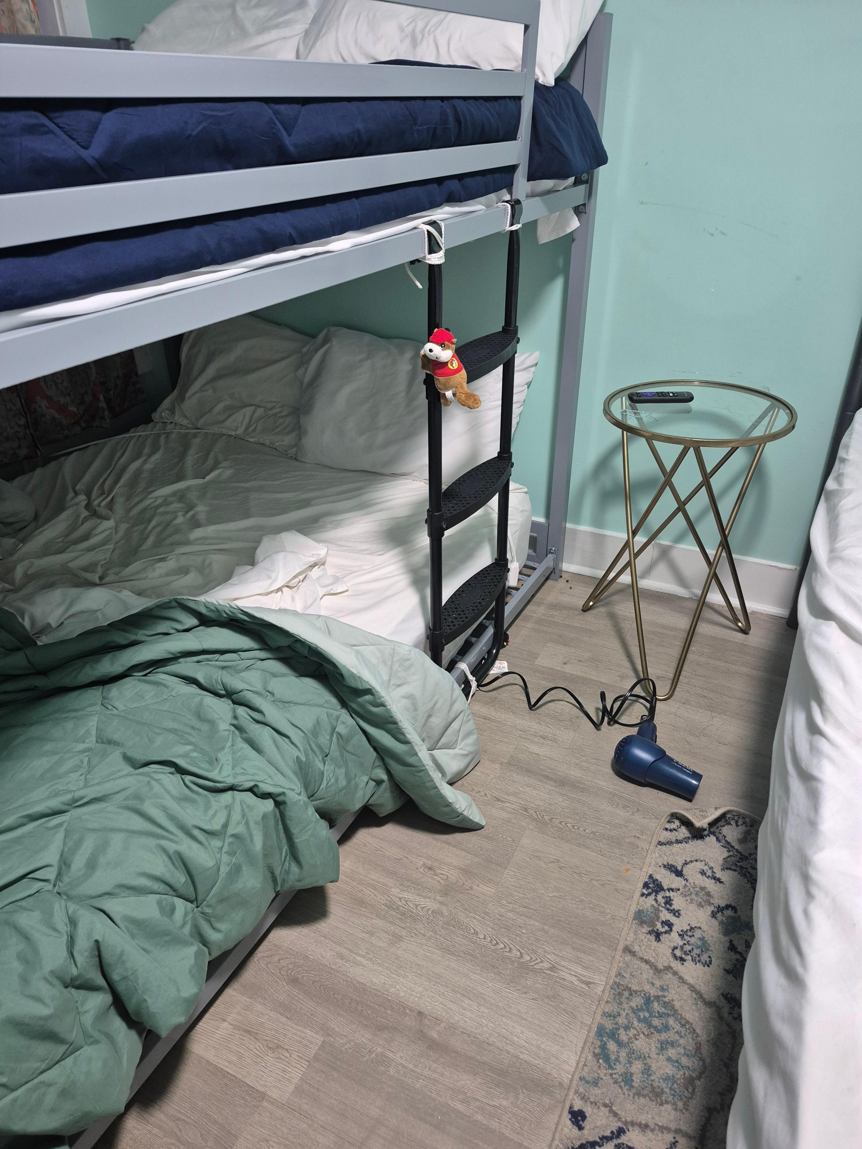 Blow dryer on floor of unpaid bedrooms.