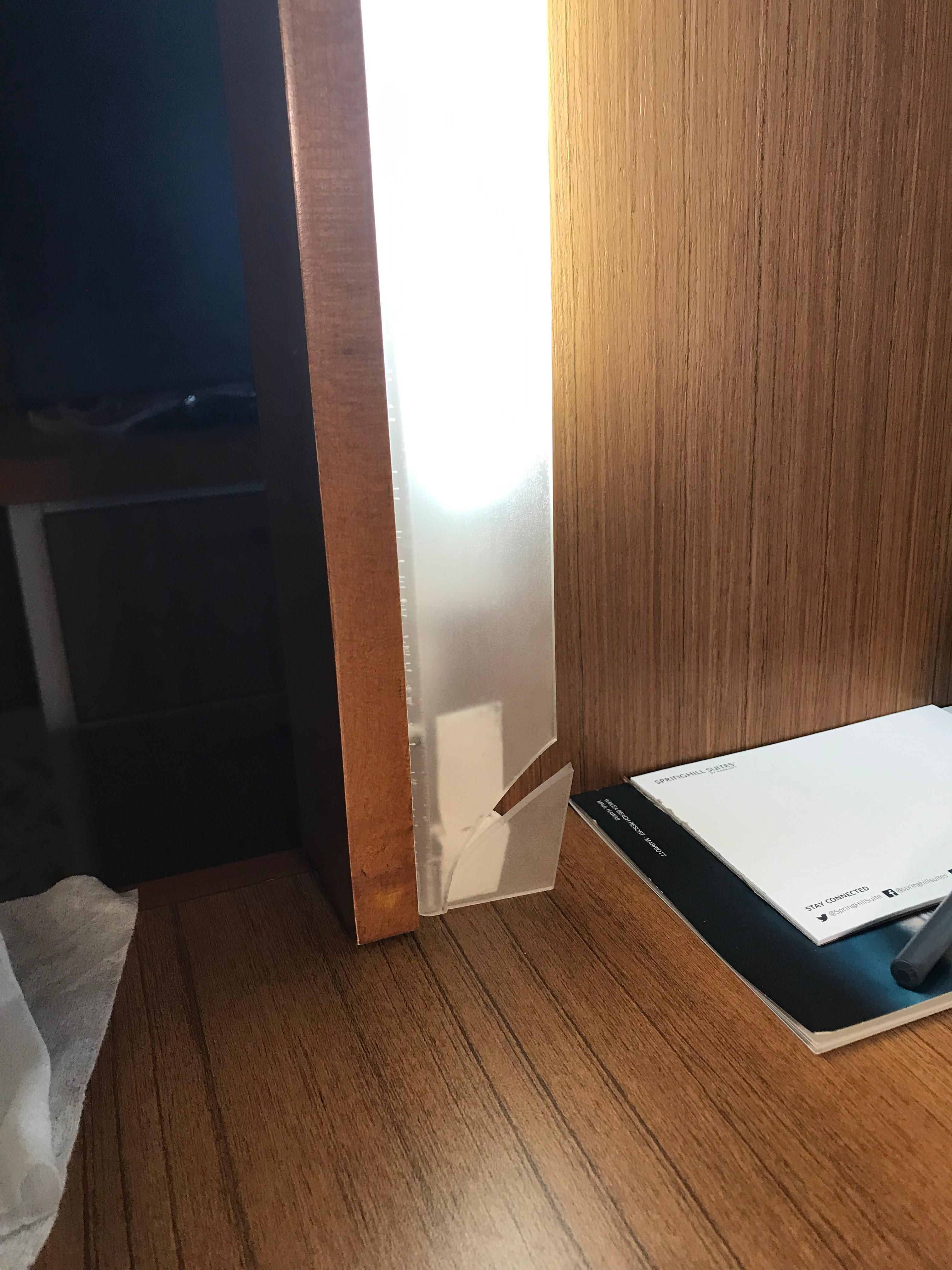 Broken plastic on the desk. 