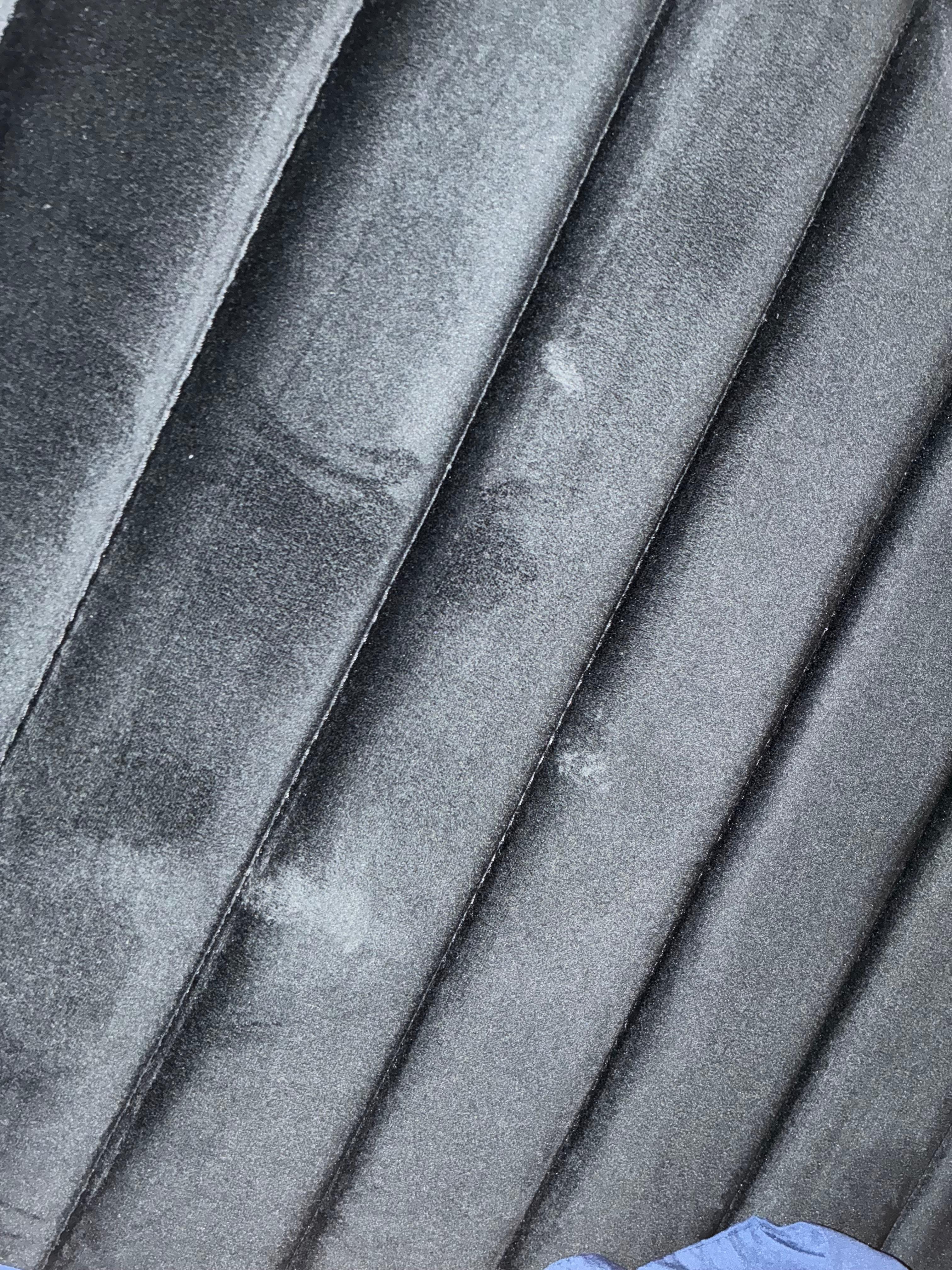 These were the white crusty stains on the headboard it's disgusting. 