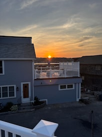 View of sunset from rooftop deck
