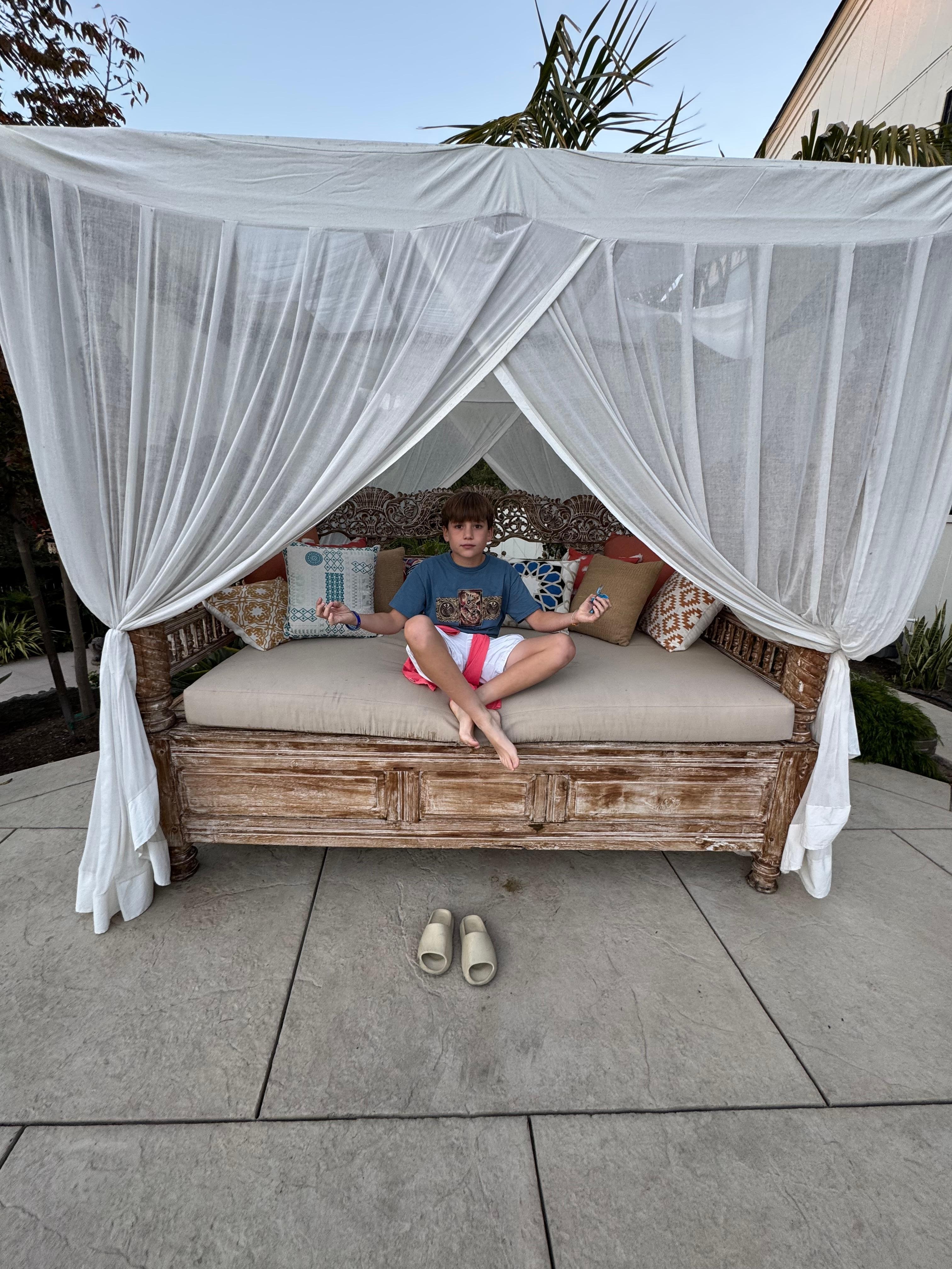 A little zen time for the youngest as we grilled on the community grill one evening. 