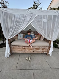 A little zen time for the youngest as we grilled on the community grill one evening.