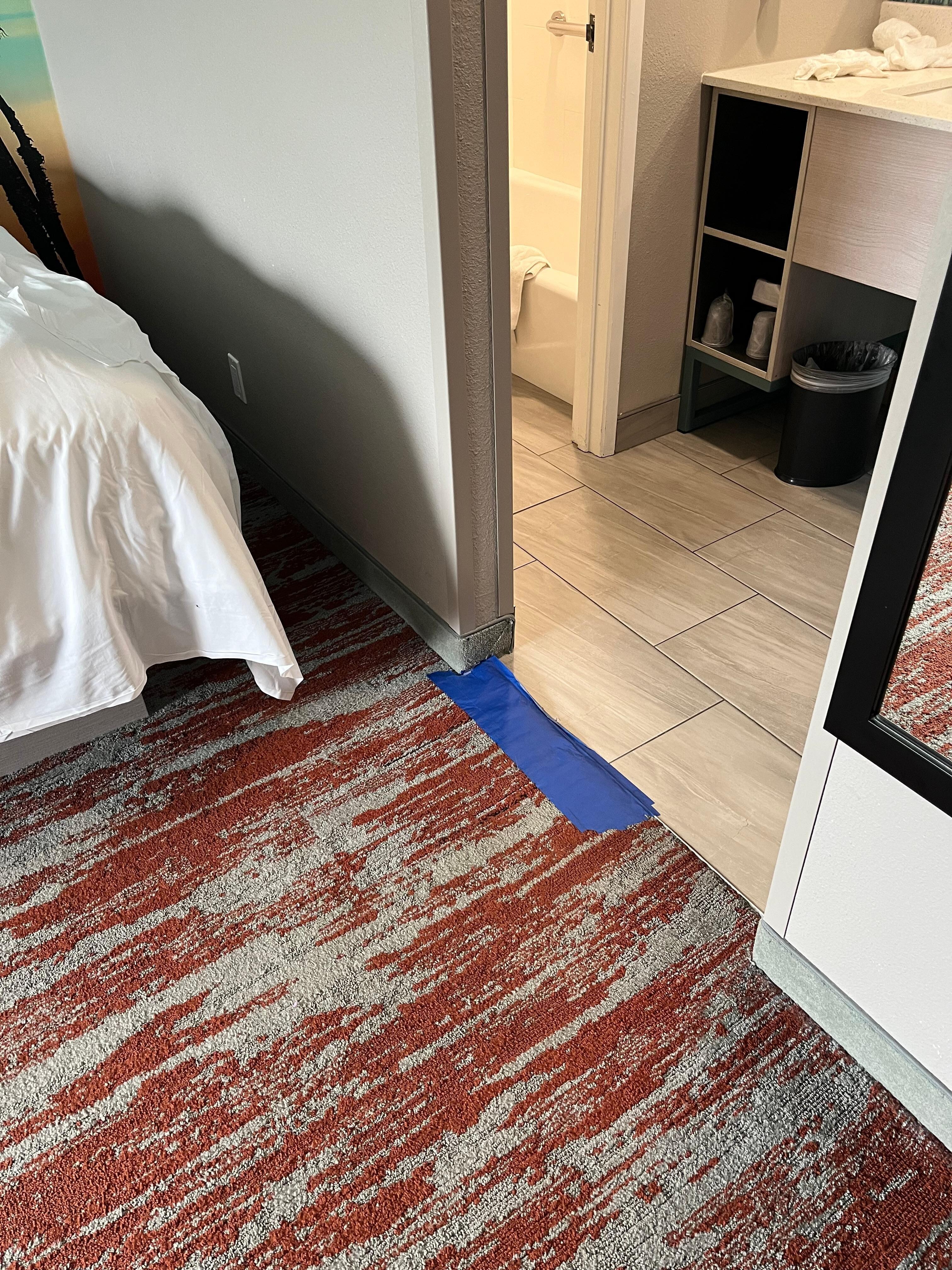 Tape holding carpet down