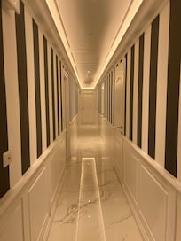 Room 6 at the end of the corridor