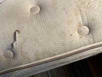 More mattress stains and cigarette burn