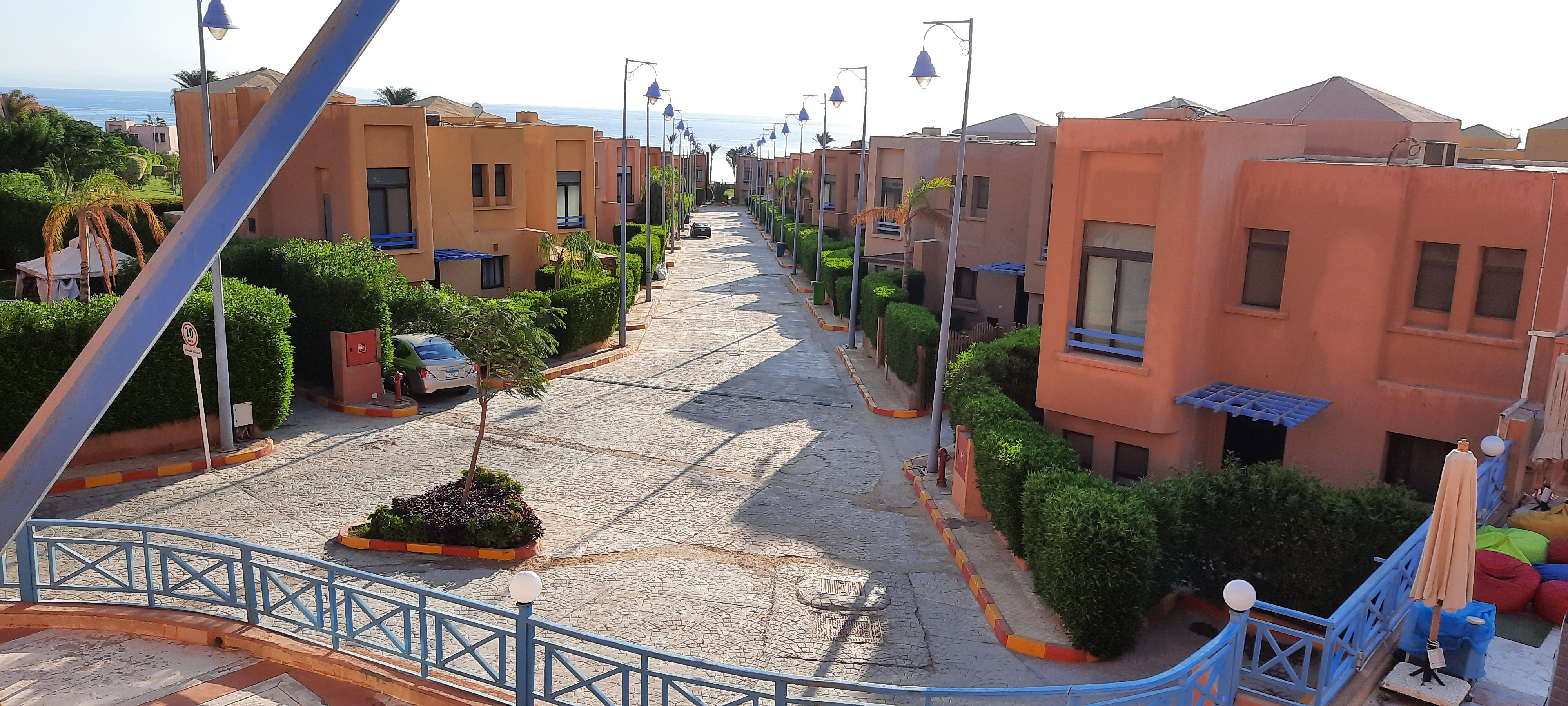 A road through the hotel with many villa