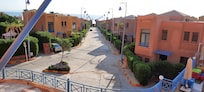 A road through the hotel with many villa