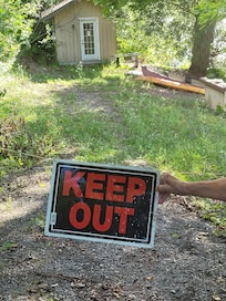 Grass overgrown leading to dock