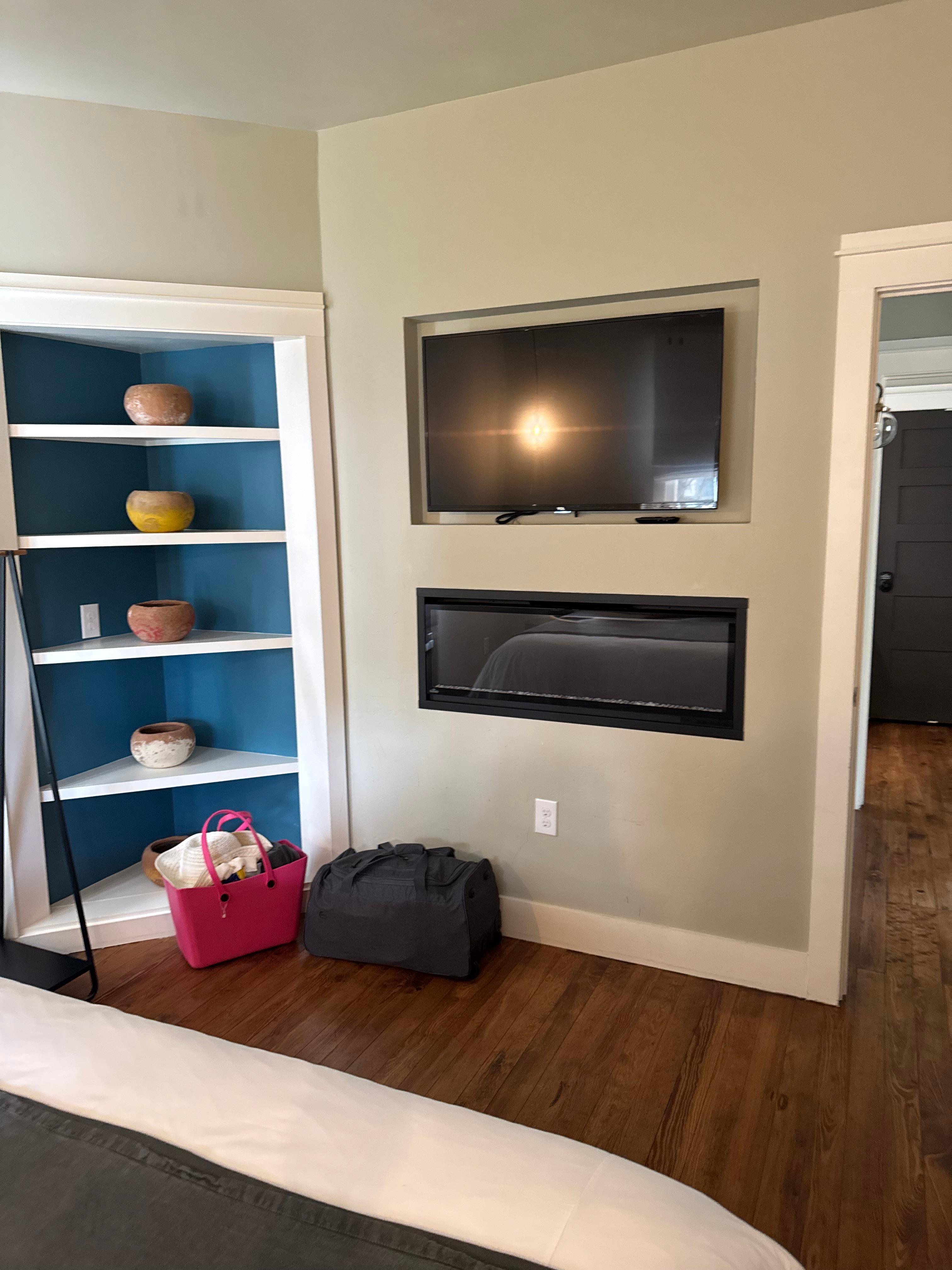 Bedroom tv and fireplace
