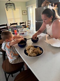 Helping mom prepare dinner