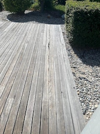 Rotten deck boards, dangerous with splinters (and a wasp nest which wasn't removed after reporting)