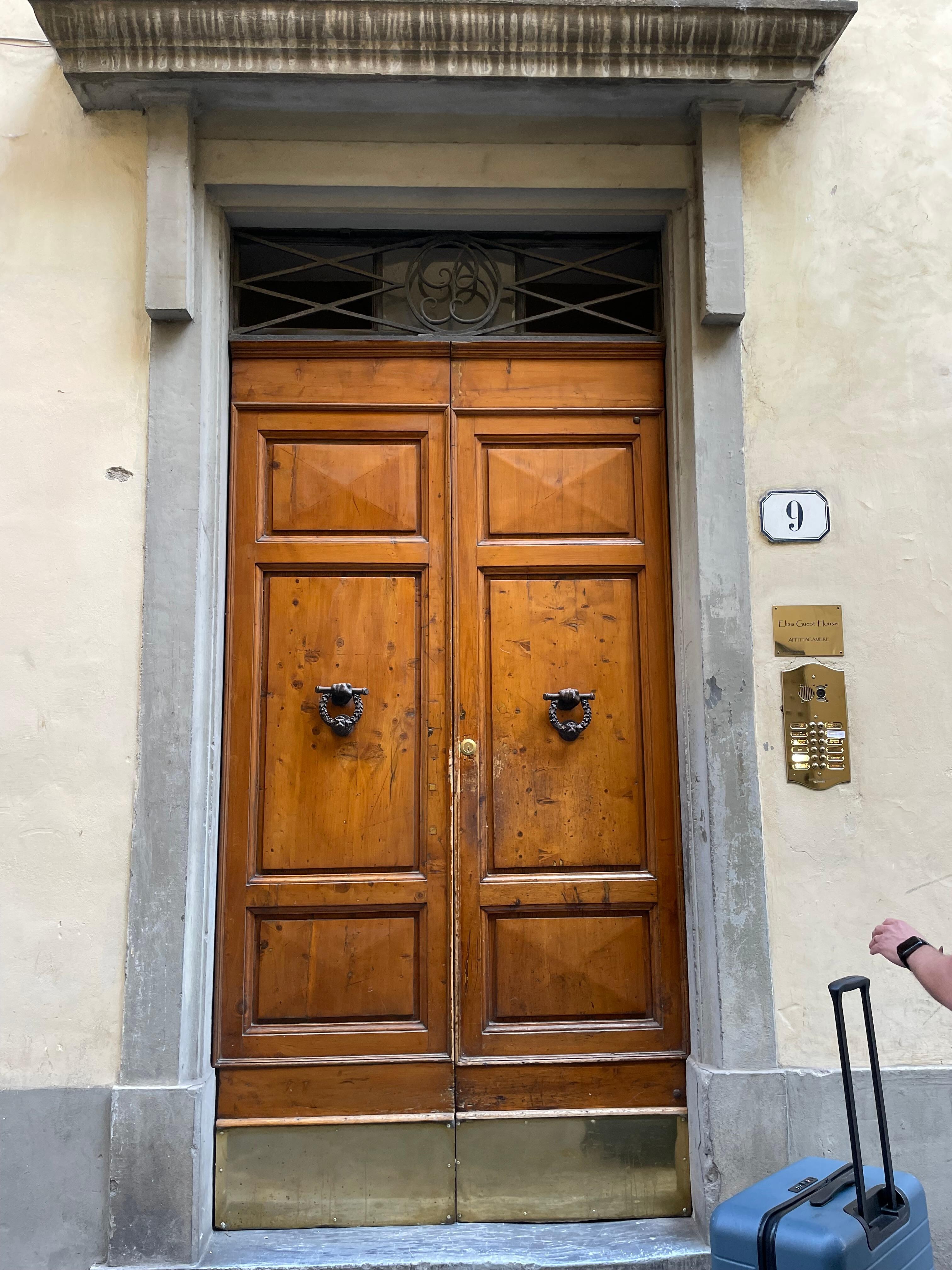 The front door to the building from the street
