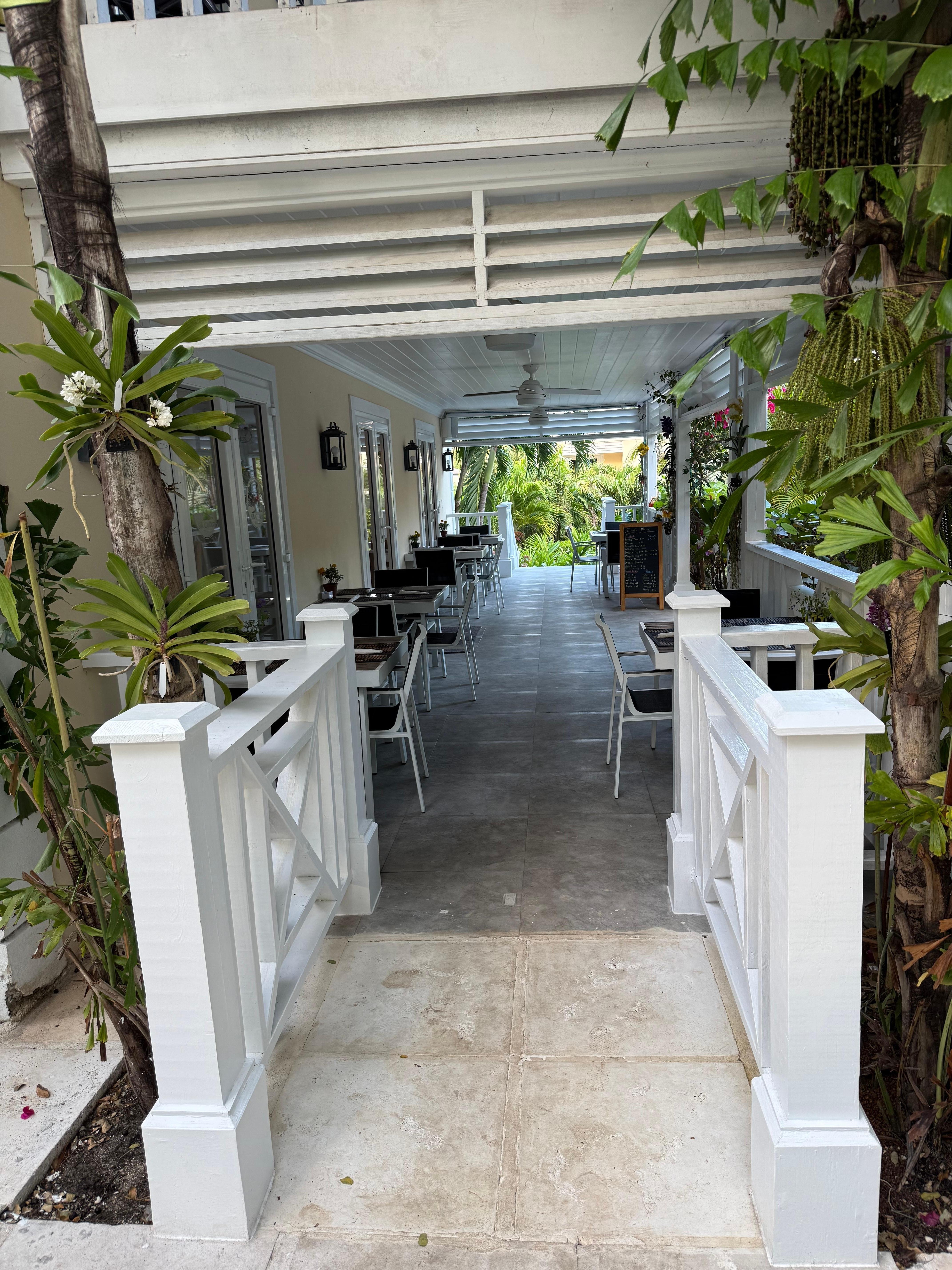 Outdoor seating at property restaurant .