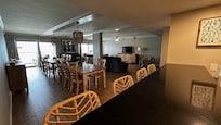 Large double living room with lots of sitting/playing area and a sleeper sofa. The two dining tables were a plus.