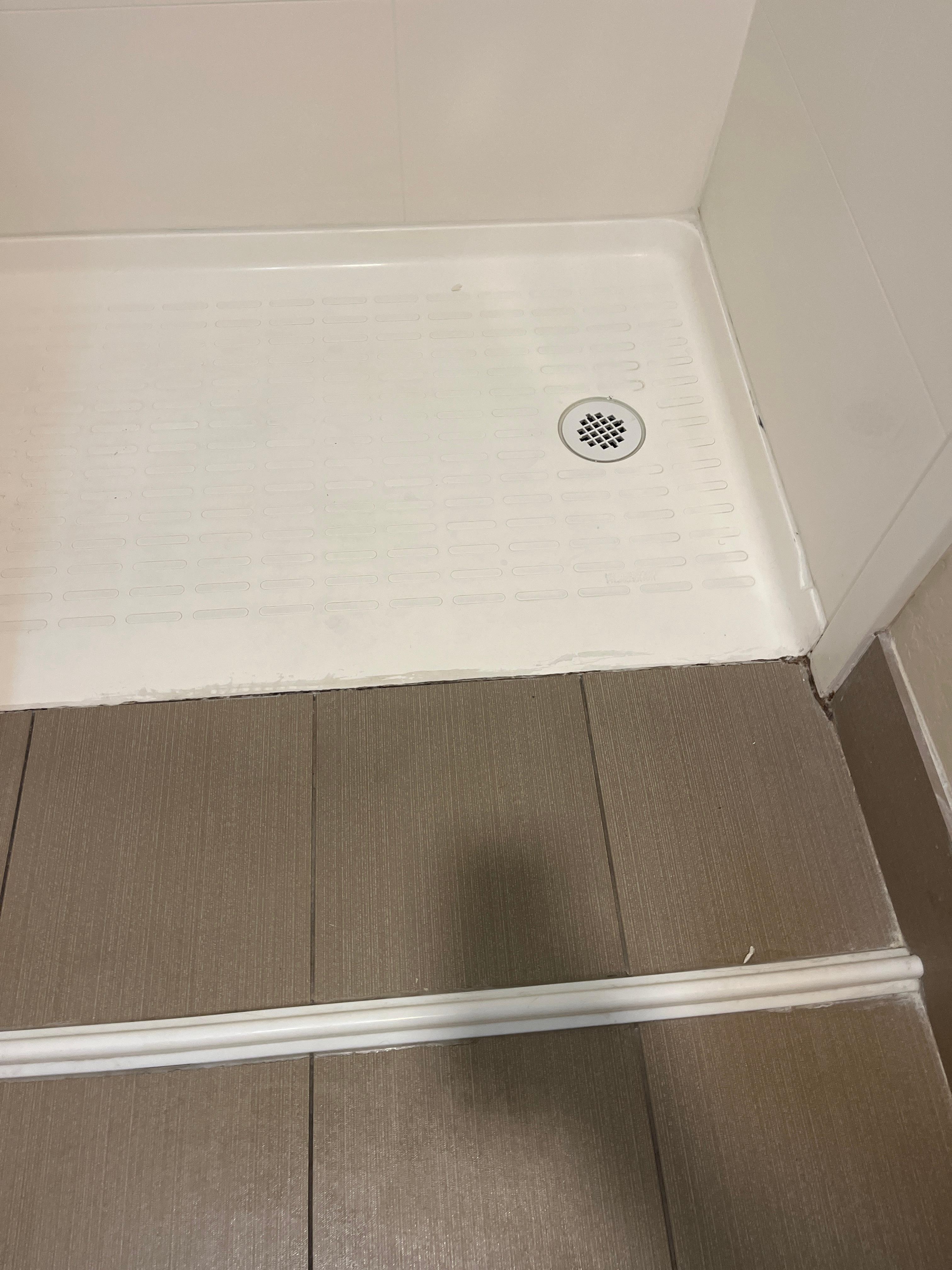 Slippery tile next to shower