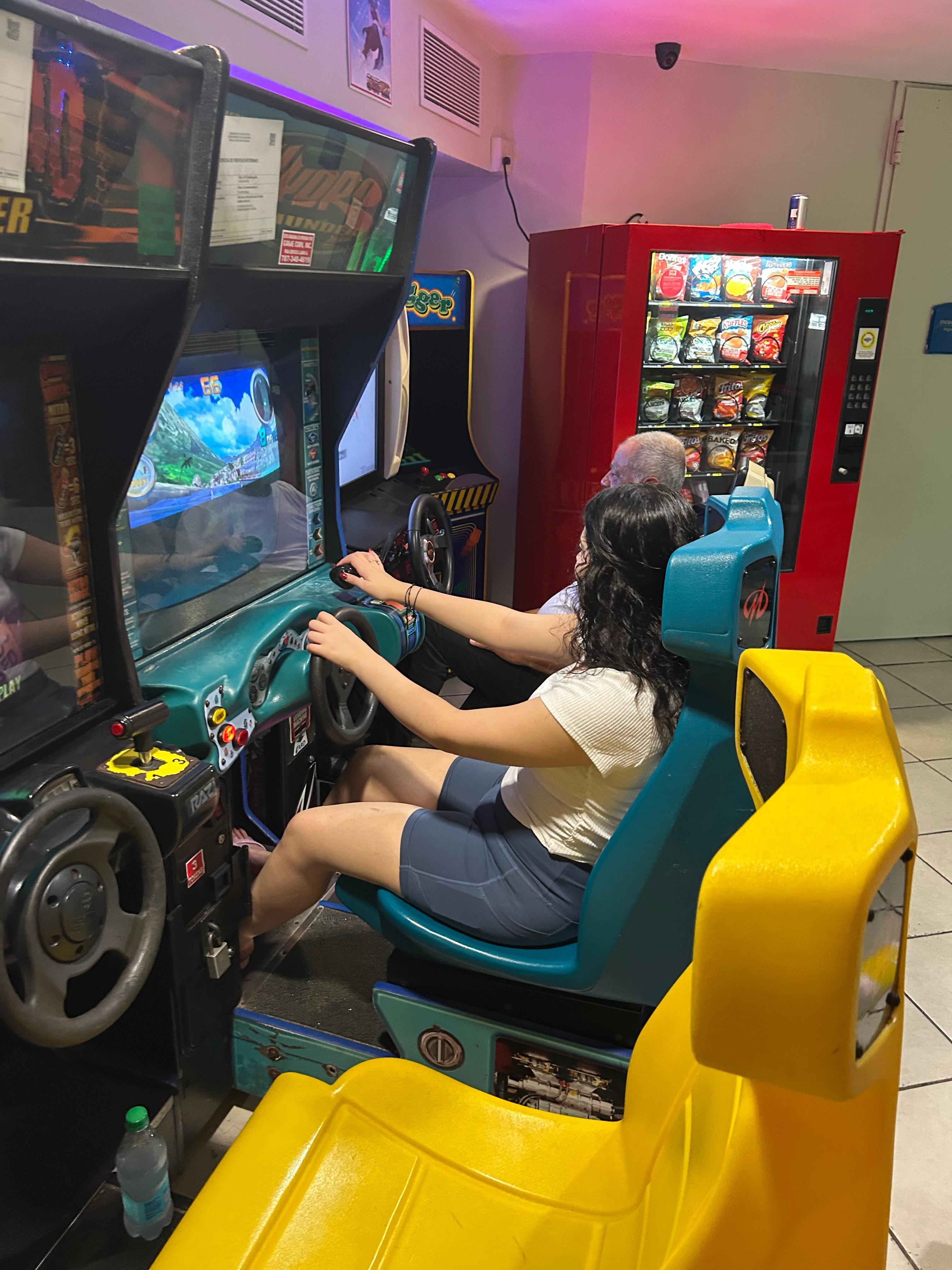 My daughter enjoying the arcade 