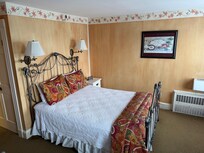 Third floor room with Queen bed.