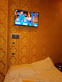 Télé au dessus de la tête de lit??