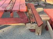 Table spliced together with pieces of wood