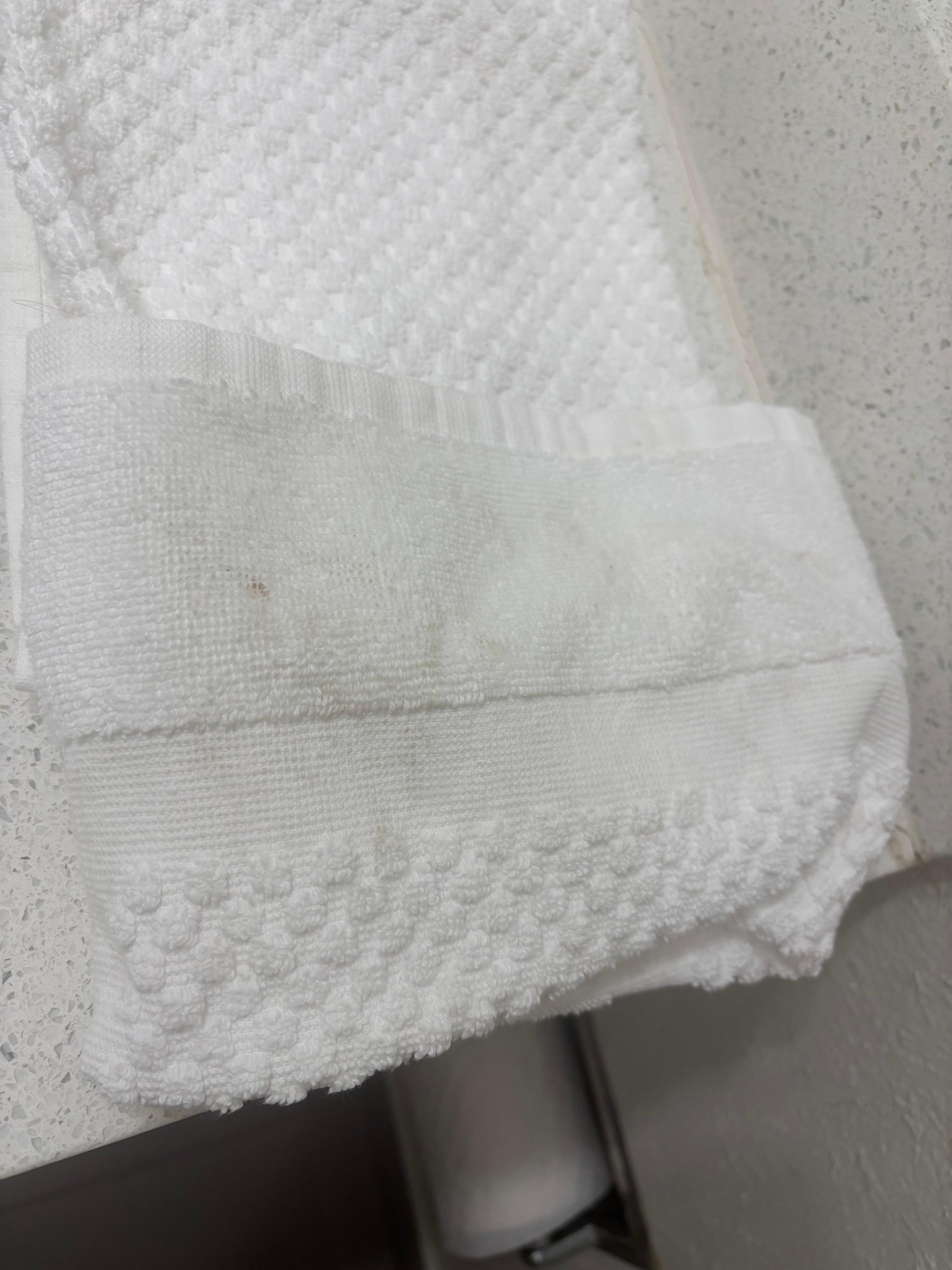 Dirty used towel upon check in