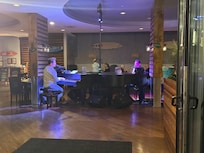Live dueling piano at the restaurant which has heated outdoor oceanfront seating