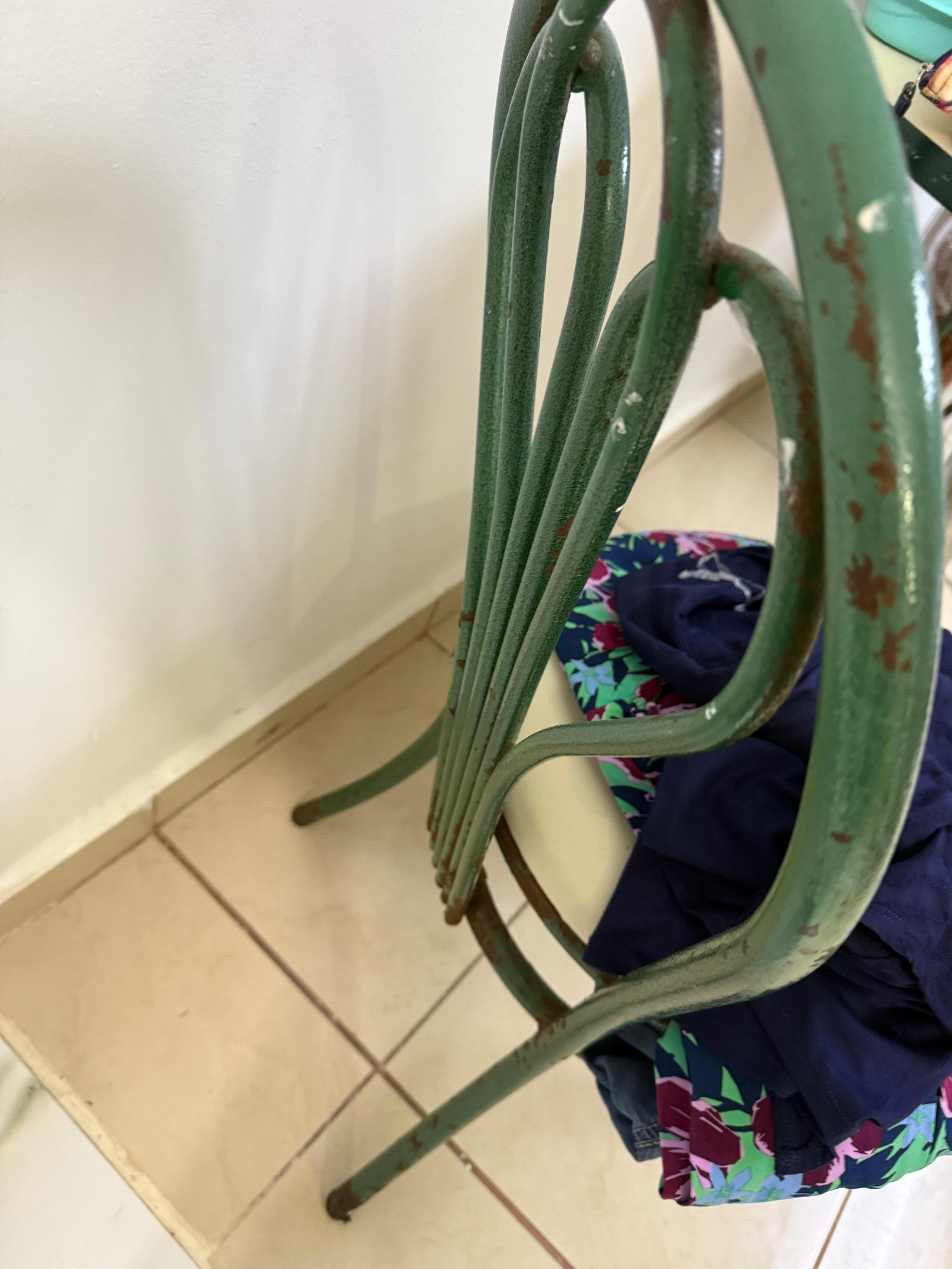 rusty chairs in room
Paint peeled
