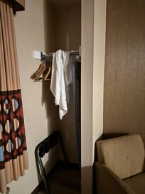 Dirty towel just left hanging in the room