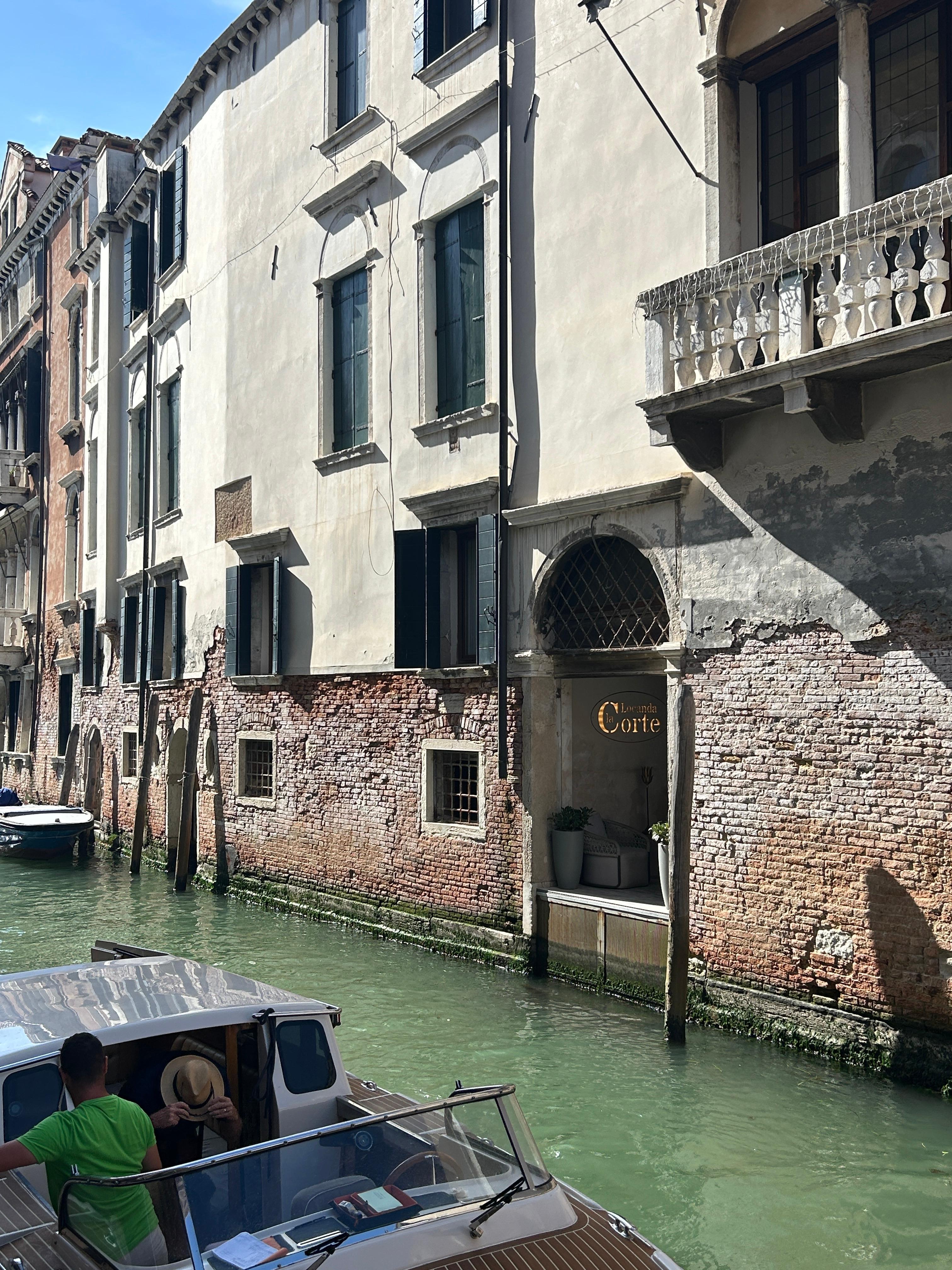 View of the Hotel from across the canal. Our room was the two windows directly left of the hotel's boat pull-up.