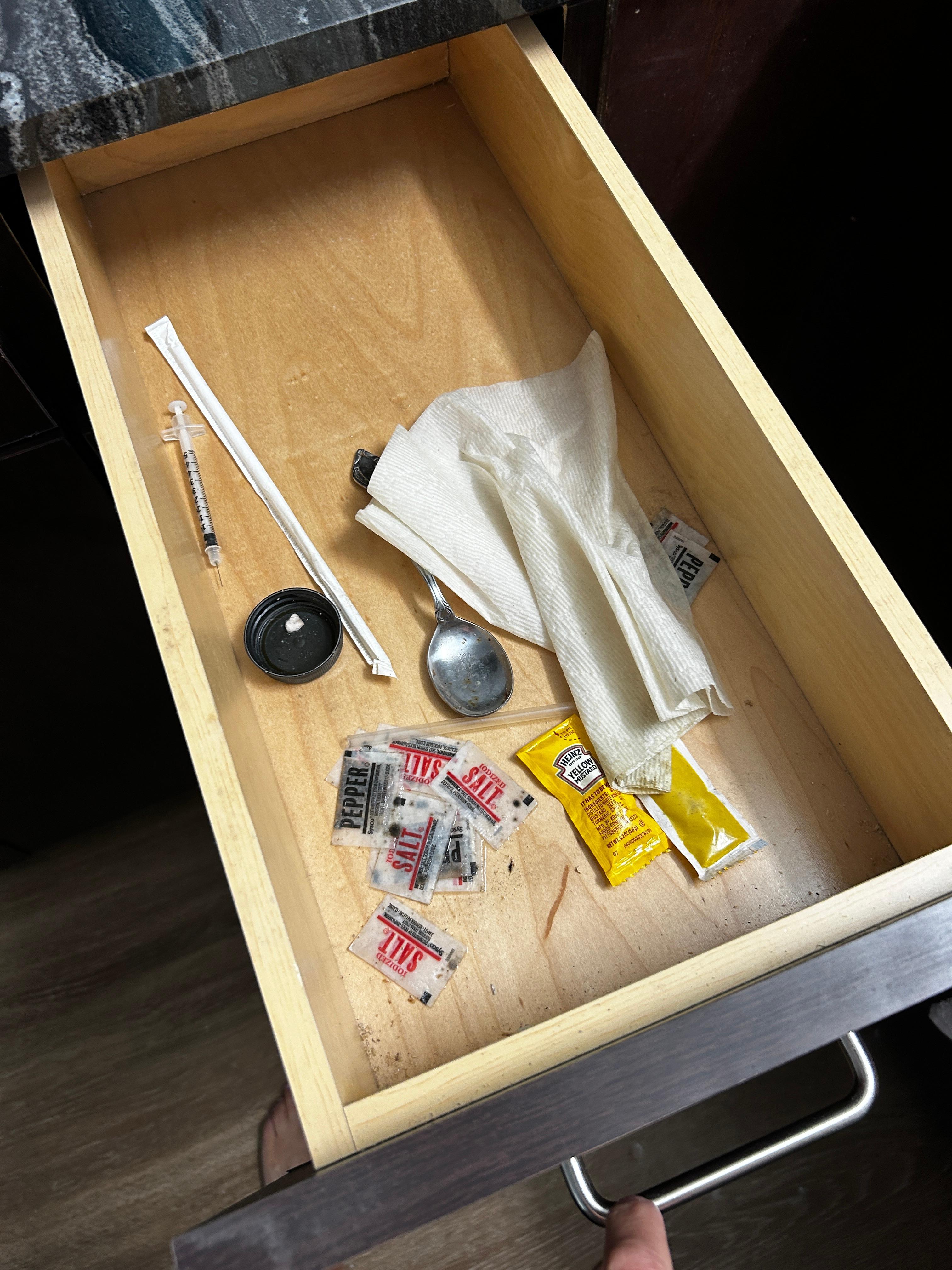 Drug paraphernalia in kitchen drawer 