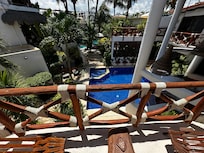 View from room of pool and bar.