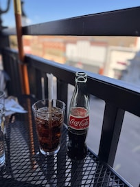 A coke and a smile on Main Street.