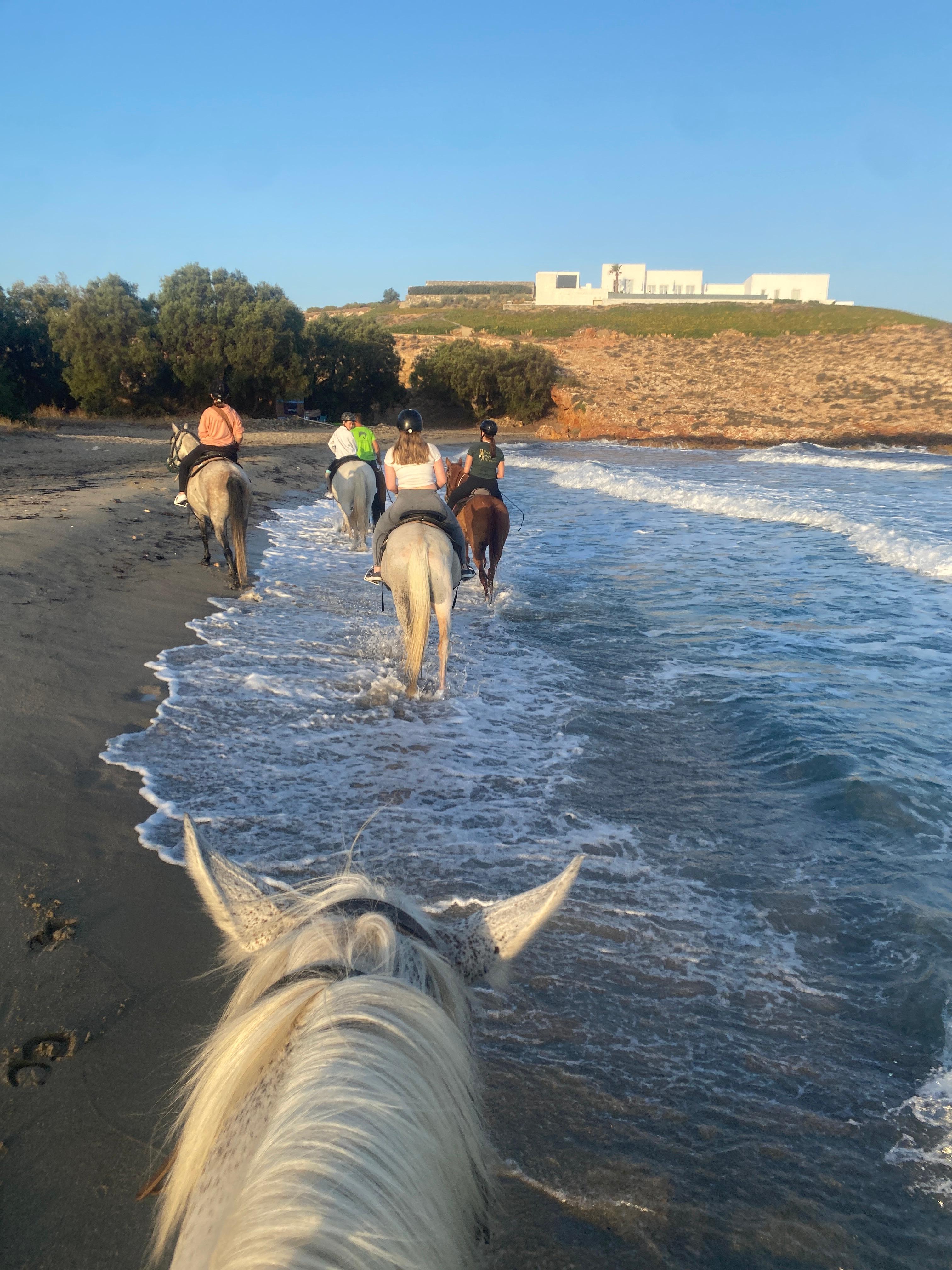 Horse riding on the beach in Paros