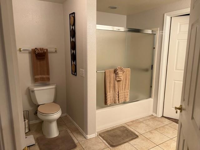 Large Bathroom with Closet. In the closet were items needed to go swimming, play all different sports around the complex. 