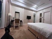 One of the bedrooms. The other room has a small living room situation.