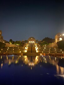 Pool and garden view at night