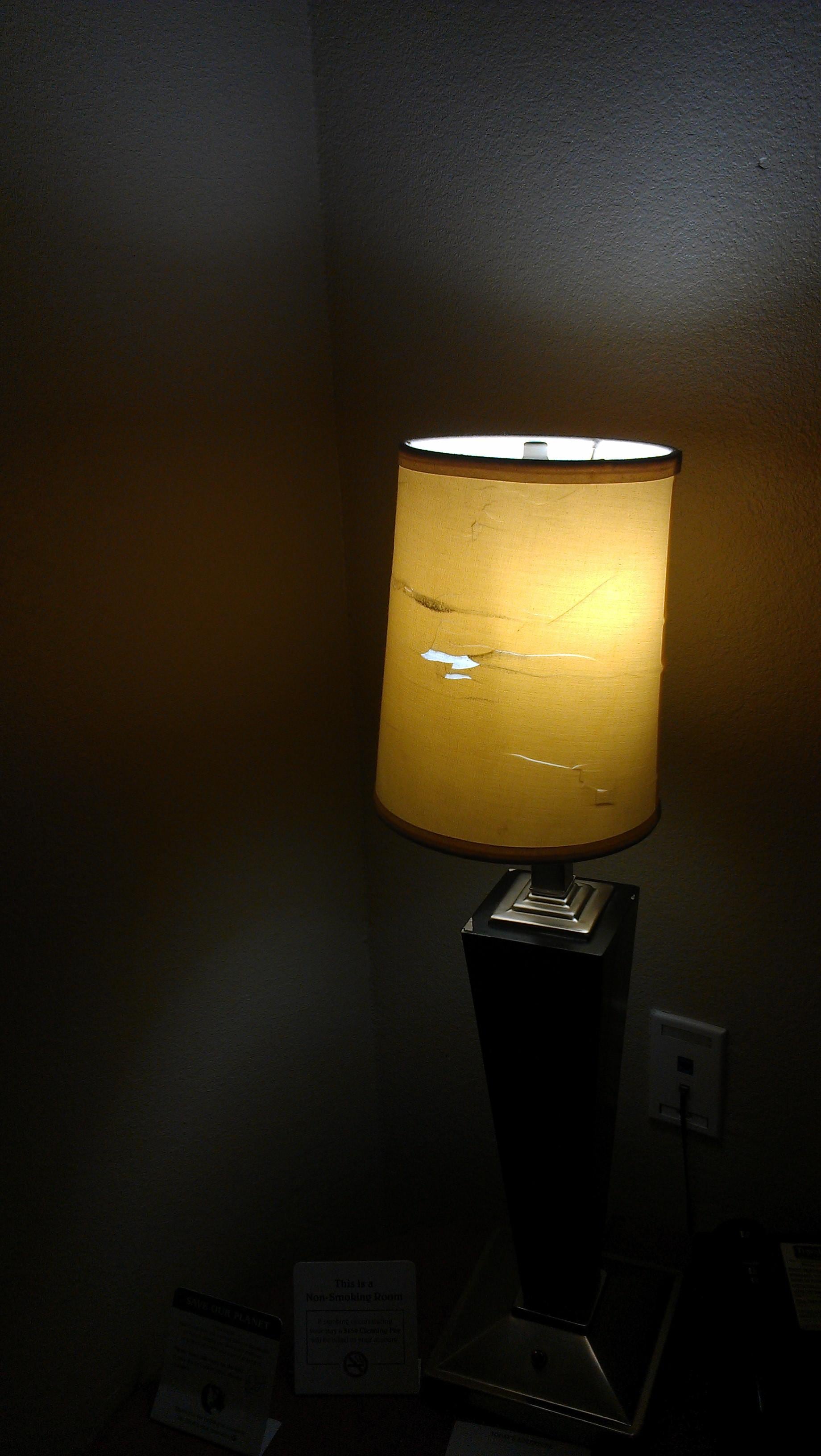 torn lamp shade