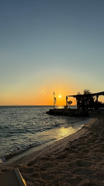 Sunset from the beach in front of the hotel