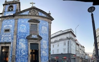 across the hotel is a church with tiles on its exterior
